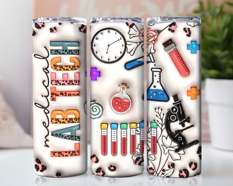 May include: A white tumbler with a leopard print design and the words "Lab Tech Medical" in colorful letters. The tumbler is decorated with various medical symbols, including a clock, a beaker, a microscope, test tubes, and a plus sign.