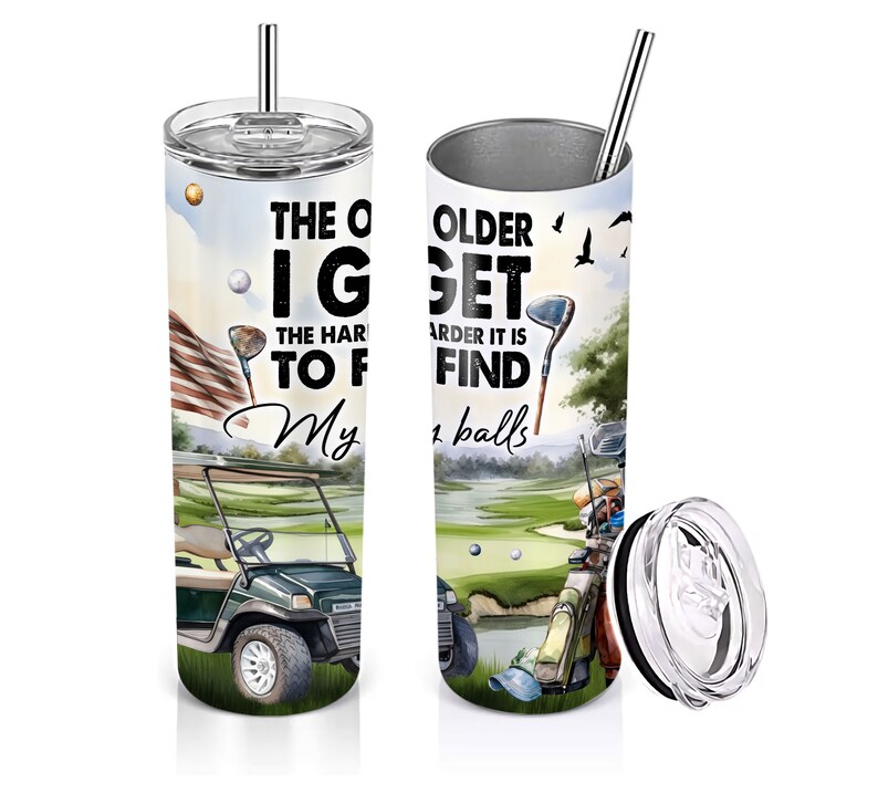 May include: A stainless steel tumbler with a golf-themed design. The tumbler features a green golf course with a golf cart, golf clubs, and golf balls. The text on the tumbler reads "The older I get the harder it is to find my balls".