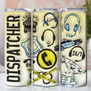 May include: A white tumbler with a yellow background and black text that says "DISPATCHER". The tumbler is decorated with police-themed graphics, including a police car, a badge, a headset, and a phone.
