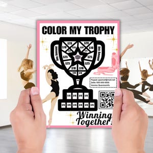 May include: A pink and black poster with the text "COLOR MY TROPHY" and a black silhouette of a trophy with dollar amounts on it. The poster also includes a QR code and the text "Winning Together!"