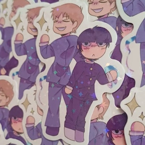May include: Holographic stickers depicting two anime-style characters in purple uniforms. The stickers have a sparkly, iridescent finish with star-shaped accents. One character is smiling, the other has a stern expression. Likely fan art.