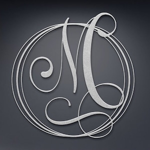 May include: A silver-colored monogram letter "M" in a decorative, cursive font, encircled by a series of elegant, swirling lines. The design is set against a dark gray background, creating a contrast that highlights the intricate details of the letter and its surrounding elements.