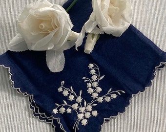 Blue embroidered handkerchief and vintage silk roses