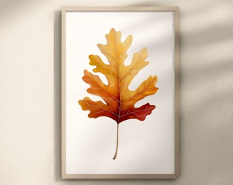 May include: A framed print featuring a watercolor illustration of a fall leaf. The leaf transitions from yellow to orange to red, with detailed veining. The frame is a light wood color, and the artwork is displayed on a white background.