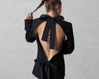 Reworked oversize black blazer with open back and big bows