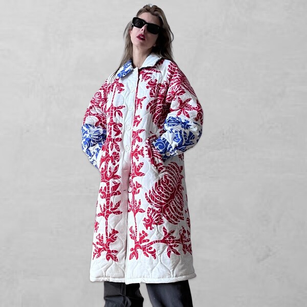 White long quilted puffer jacket with floral pattern