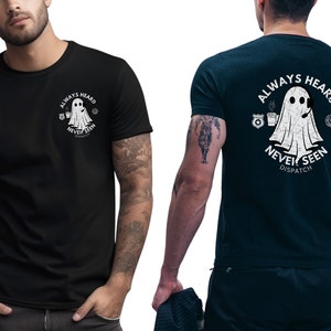 Puede incluir: Camiseta negra con un gráfico blanco de un fantasma con auriculares y sosteniendo una taza de café. El texto "Always Heard Never Seen Dispatch" está impreso debajo del fantasma.