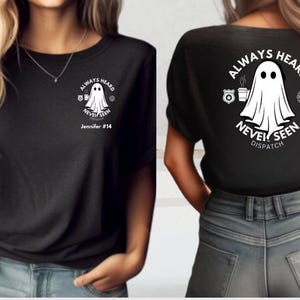 May include: Black t-shirt with a white ghost graphic and the text "ALWAYS HEARD NEVER SEEN DISPATCH". The shirt also features a small ghost graphic on the front with the text "Jennifer #14".