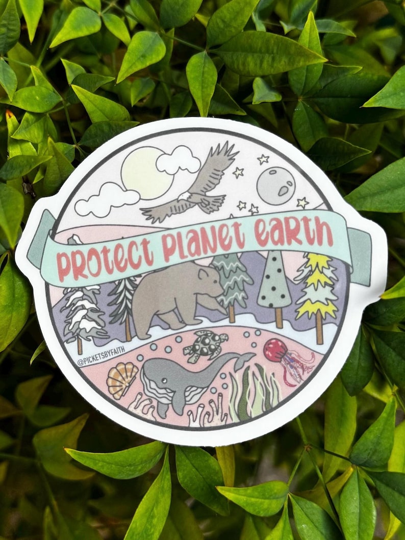 May include: A round sticker with a colorful illustration of a bear, a whale, a turtle, a bird, and a jellyfish. The sticker has the text "Protect Planet Earth" in a banner at the top.