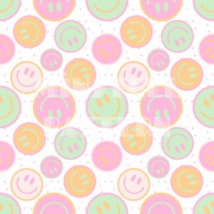 May include: A repeating pattern of smiley faces in shades of pink, orange, and green on a white background. The smiley faces vary in size and are scattered across the image, with small gray dots.