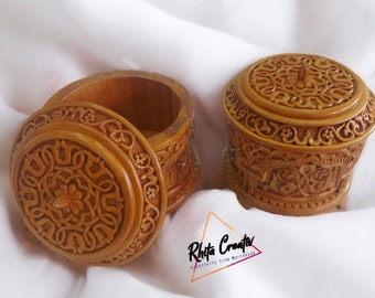 Hand-carved wooden box: Unique, elegant, intricately crafted. Used for storage, adds beauty. Perfect gift for loved ones.