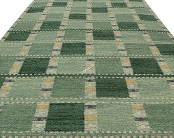ANNA-GRETA SJÖKVIST. carpet, fitted sheet, decor in blue with white border.