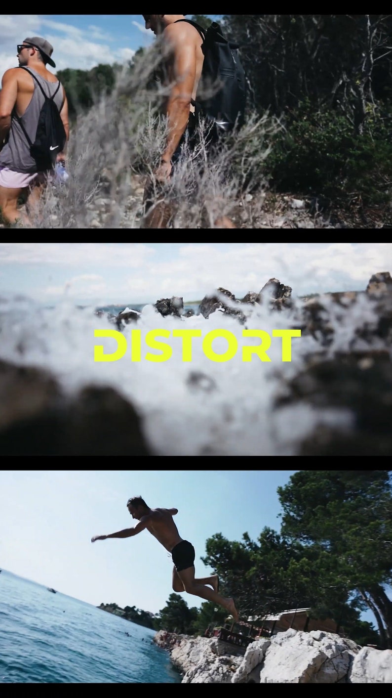 May include: Three men are enjoying a day at the beach. One man is jumping off a cliff into the blue water. Another man is walking along a rocky path. The word "DISTORT" is written in yellow letters on a rocky beach.