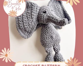May include: A gray crocheted elephant amigurumi toy with large floppy ears. The toy is sitting on a white surface. The image includes the text "Brandon & Rae Crochet Pattern".