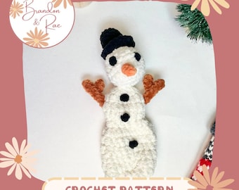 May include: Crochet pattern for a white snowman with black eyes, a black hat, an orange nose, and brown arms. The snowman is on a white background.