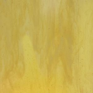 May include: A sheet of stained glass with a mottled, flowing pattern in shades of yellow and gold. The glass has a translucent quality, with variations in color and texture throughout the surface.