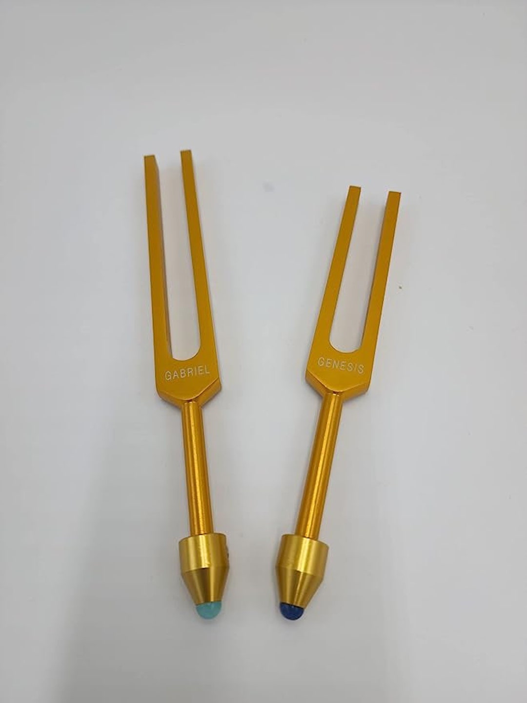 Gabriel and Genesis Gold Color Tuning Fork Geminfused Feet for