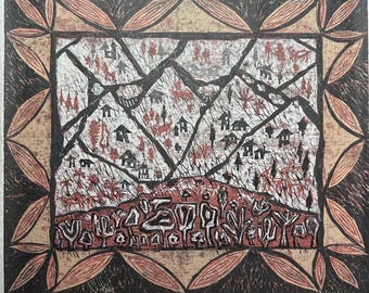 May include: A print featuring a village scene with houses and trees in red and black. The artwork has a decorative border with a repeating leaf pattern. The print is on a white background.