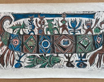 May include: A woodcut print titled "Isabelle Voyage" by Peter Krog, 1992. The artwork depicts a boat with stylized figures and geometric patterns in shades of brown, blue, green, and pink. The print is on textured paper.