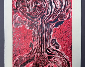 May include: Red and black abstract art print featuring a tree-like design with swirling patterns. The artwork is on a white background, with the title "Fantaster Fountain" and the artist's signature at the bottom. The print is held in place with small stones.
