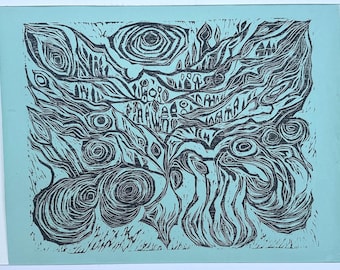 May include: A black and white abstract linocut print on a light blue background. The print features swirling, organic shapes and patterns, including circular and linear elements, creating a textured, artistic design. The artwork has a handmade aesthetic.