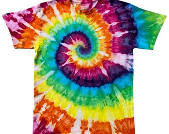 May include: A short-sleeved t-shirt featuring a vibrant, multi-coloured tie-dye spiral pattern. The design radiates from the centre in shades of bright yellow, orange, pink, purple, and blue, covering the entire front of the garment.