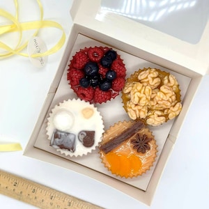 Handmade soap in the form of cupcakes in a gift box. a thank you gift. set of soaps.