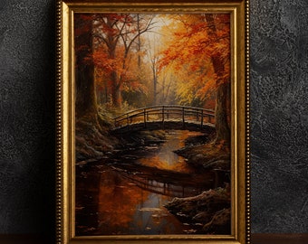 May include: A framed painting depicting a woodland scene with a wooden bridge spanning a stream. The trees are in autumnal colours, with red, orange, and yellow leaves. The stream reflects the colours of the trees.