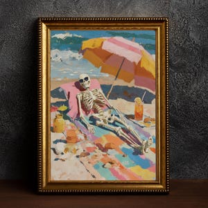 May include: A framed painting depicts a skeleton relaxing on a beach. The skeleton wears sunglasses and is under a striped umbrella. The beach scene includes a drink, a pink towel, and colorful sand. The painting is in a gold frame.