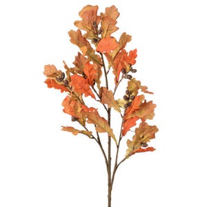 May include: A decorative fall-themed stem featuring oak leaves in shades of orange, brown, and gold. The artificial foliage includes small, dark brown accents, creating a realistic autumn aesthetic. Perfect for seasonal home decor.