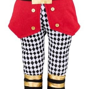 May include: A whimsical decorative item featuring a red jacket with gold buttons and a black belt with a gold buckle. The legs are patterned with a black and white diamond design, and the boots are black with gold accents.