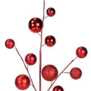 May include: A decorative red Christmas ornament spray with multiple round ornaments of varying sizes. Some ornaments have a shiny finish, while others have a glittery texture. The spray has a dark red stem and branches.