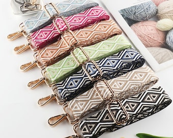 May include: A set of eight colorful woven straps with gold metal clasps. The straps have a geometric pattern and are perfect for adding a pop of color to any bag.