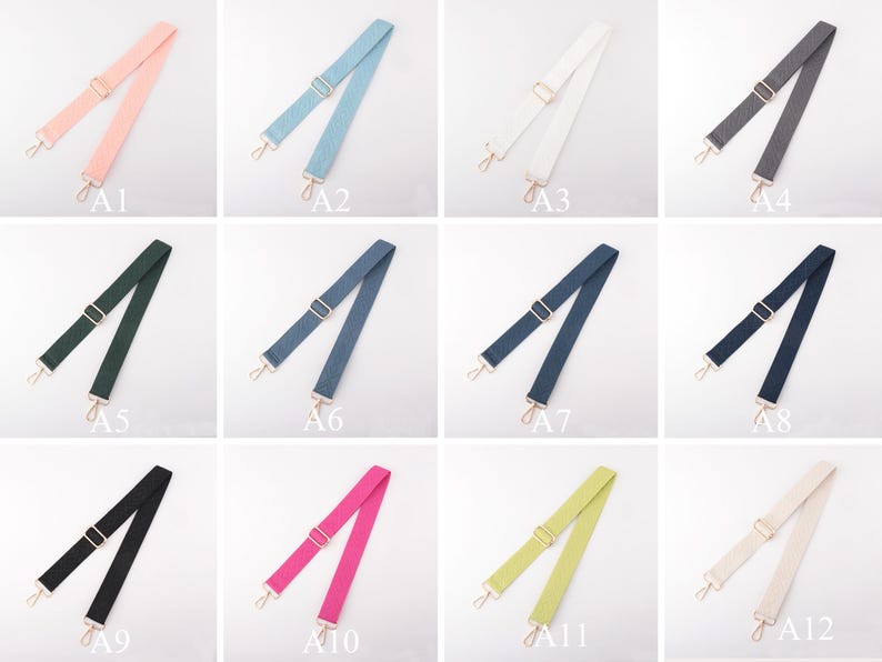 May include: A collection of adjustable bag straps in various colors, including pink, blue, white, gray, green, navy, black, fuchsia, yellow-green, and beige. Each strap has gold-colored metal hardware for attachment.