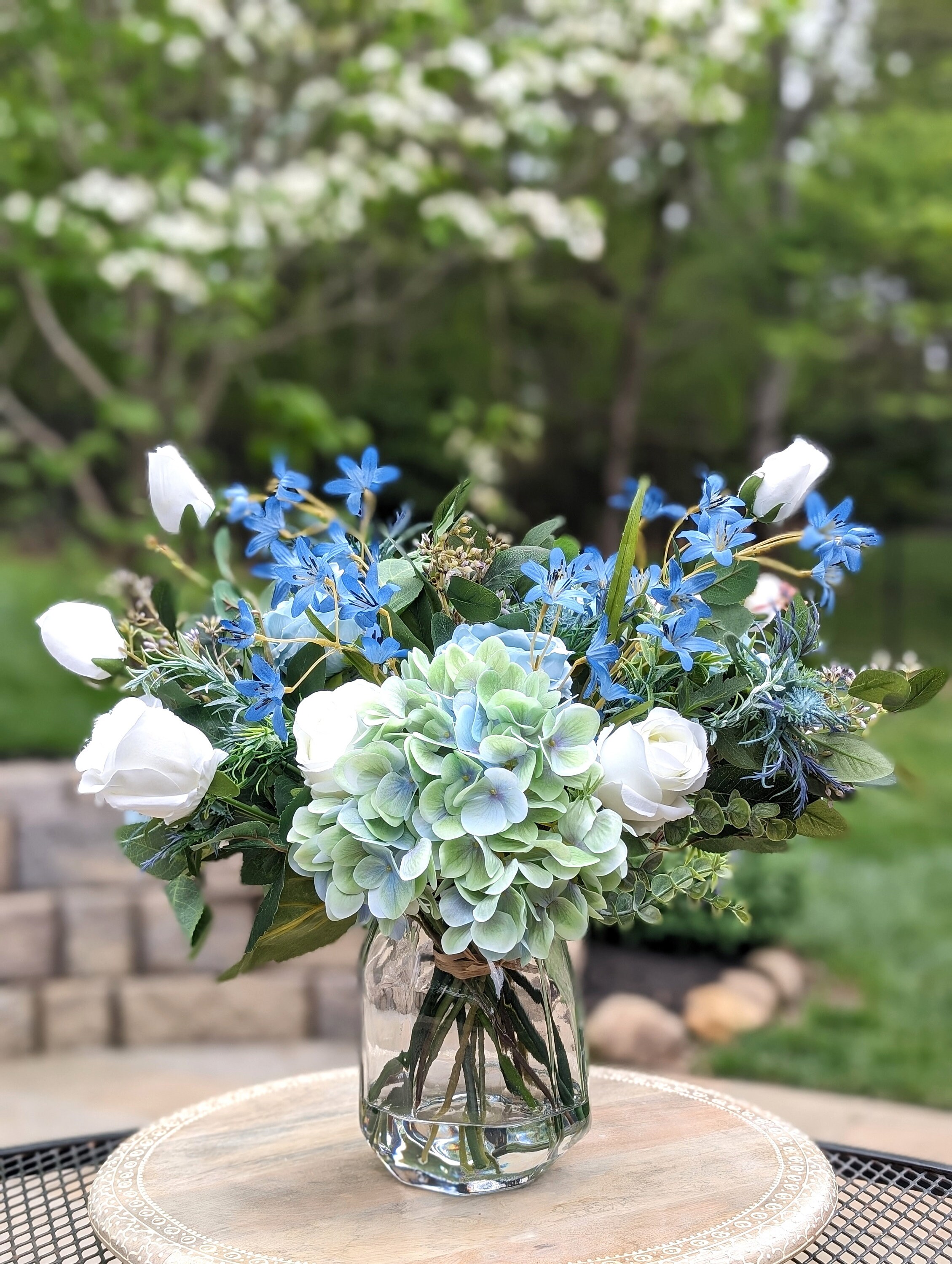 A Continental Blue and White Floral Garden Vase. A Continental Blue and White Floral Garden Vase.