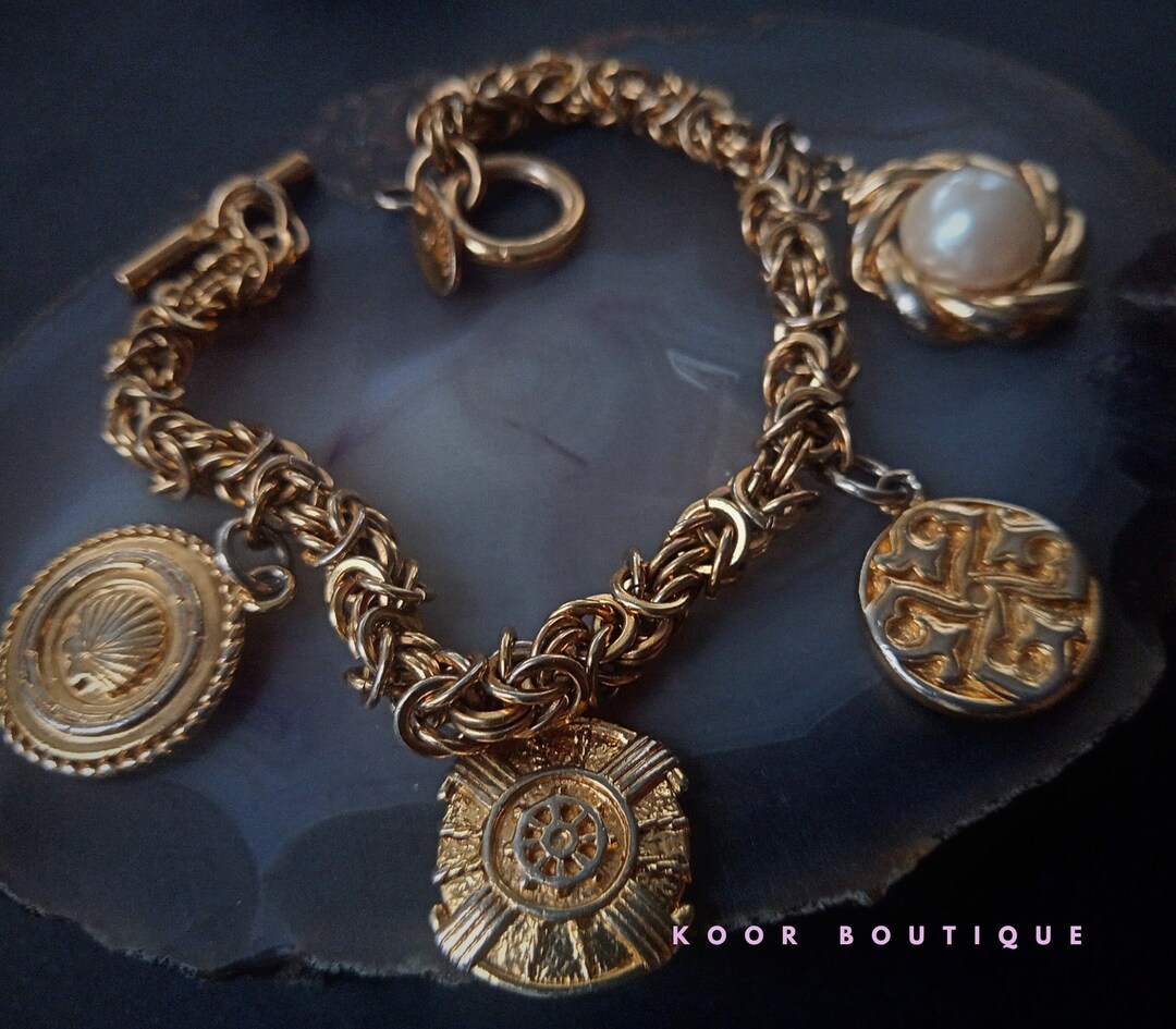 Bracelet Vintage Guy Laroche Paris - 8 Breloques Dorés - 57,9 G 20 Cm - Occasion à Nettoyer