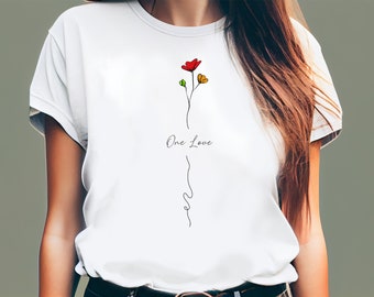 May include: White t-shirt featuring a simple line drawing of a flower and the text "One Love" on the front.