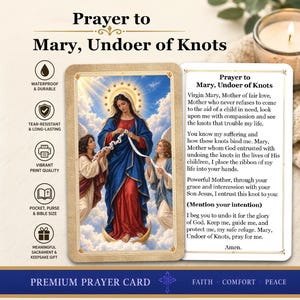May include: A rectangular prayer card titled Prayer to Mary, Undoer of Knots. The card features an illustration of the Virgin Mary in a blue and red robe, surrounded by clouds and angels, holding a white ribbon. The text includes a full prayer.