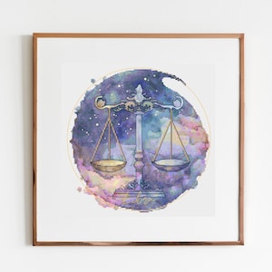 May include: A watercolour illustration of the Libra zodiac sign, featuring a scale with two pans against a background of a galaxy with stars and a watercolour wash of purple, blue, and pink.