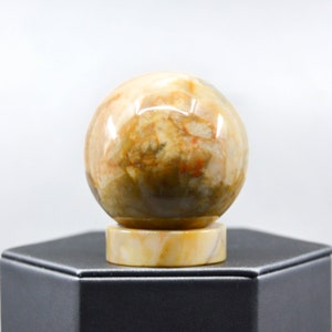 45 mm Cream and Red Agatized Fossil Coral Sphere with Base