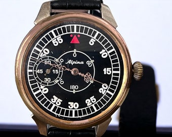 Alpina zakhorloge Zwitsers antiek Zeldzaam Zwitserland Vintage met gouden wijzers en zilveren achterkant van de kast.