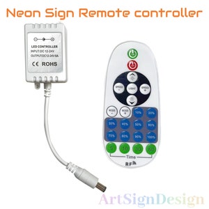 May include: White LED sign remote controller with a black and white control box. The remote has buttons for speed, light, mode, and brightness. The control box has the text "LED CONTROLLER", "INPUT:DC 12-24V", "OUTPUT:DC12-24V 6A", "CE ROHS".