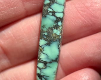 Solid peacock variscite cabochon