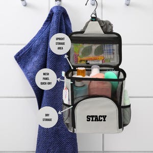 Custom mesh shower caddy with name embroidery, displayed on a door hook for dorm or travel use.
