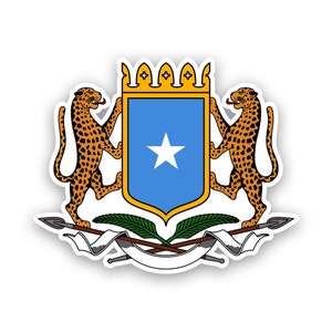 May include: The national coat of arms of Somalia features two golden leopards flanking a blue shield with a white five-pointed star. The shield is topped with a gold crown and the leopards are holding the shield with their paws. The coat of arms is surrounded by two crossed spears and a white scroll.