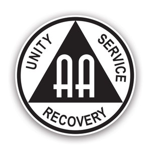 May include: Black and white circle with a triangle inside. The triangle has the letters "AA" in the centre. The words "Unity", "Service", and "Recovery" are written around the circle.
