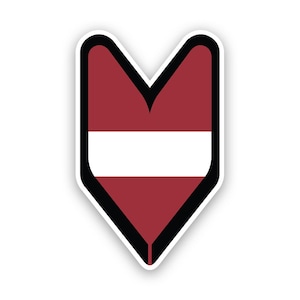May include: A sticker in the shape of a downward-pointing shield, featuring the flag of Latvia. The flag design includes a maroon background with a horizontal white stripe in the center. The sticker has a black border and a white outline.