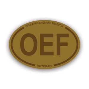 May include: A brown oval sticker with the text "Operation Enduring Freedom" and "Veteran" around the edges. The sticker has the letters "OEF" in the center.
