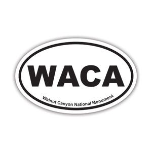 May include: White oval sticker with black text that reads "WACA Walnut Canyon National Monument".