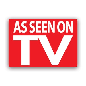 May include: A rectangular red sticker with the words "AS SEEN ON TV" in bold white letters. The letters are large and easy to read, with a white border and a slight shadow.